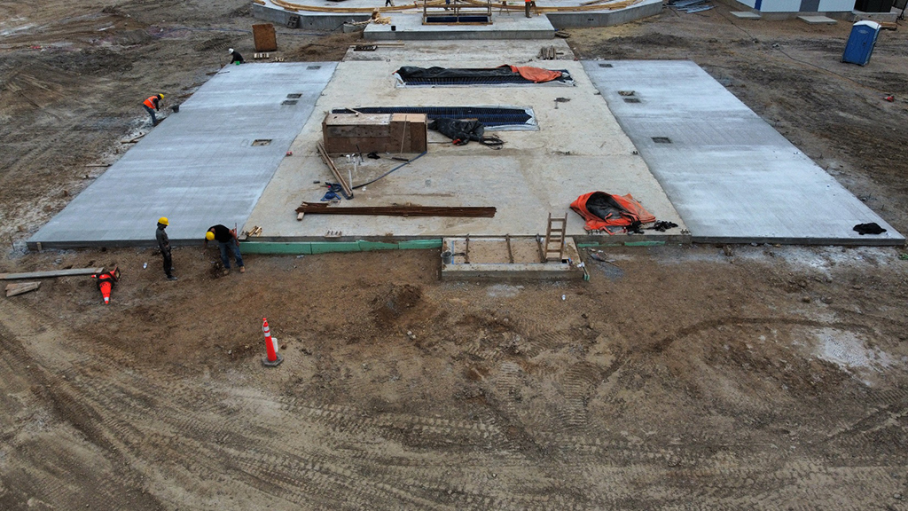 More concrete is poured for additional structure